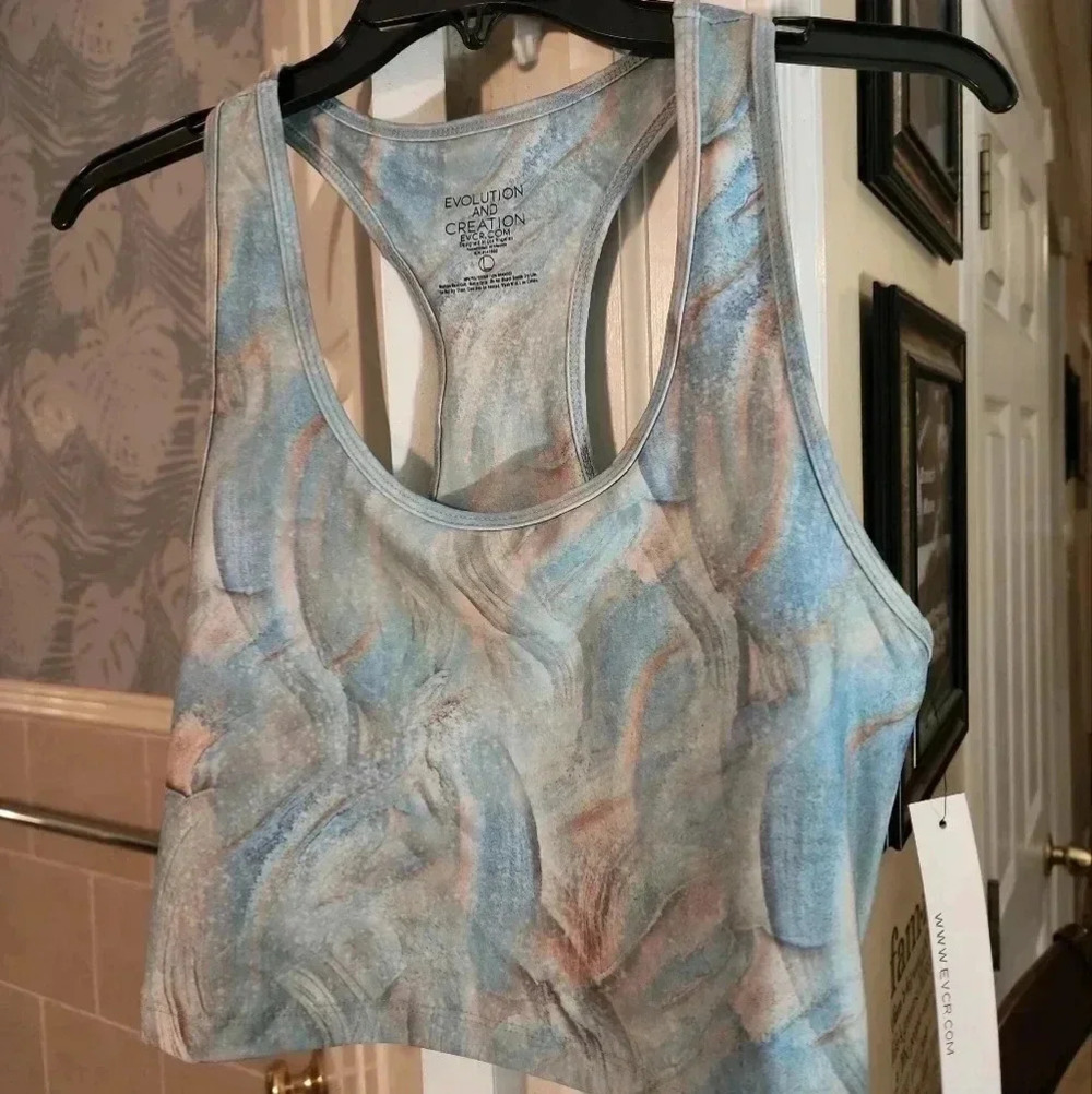EVOLUTION AND CREATION TOP